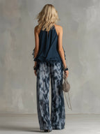 Ludovica - elegant in chiffon with a high-neck top and wide printed trousers